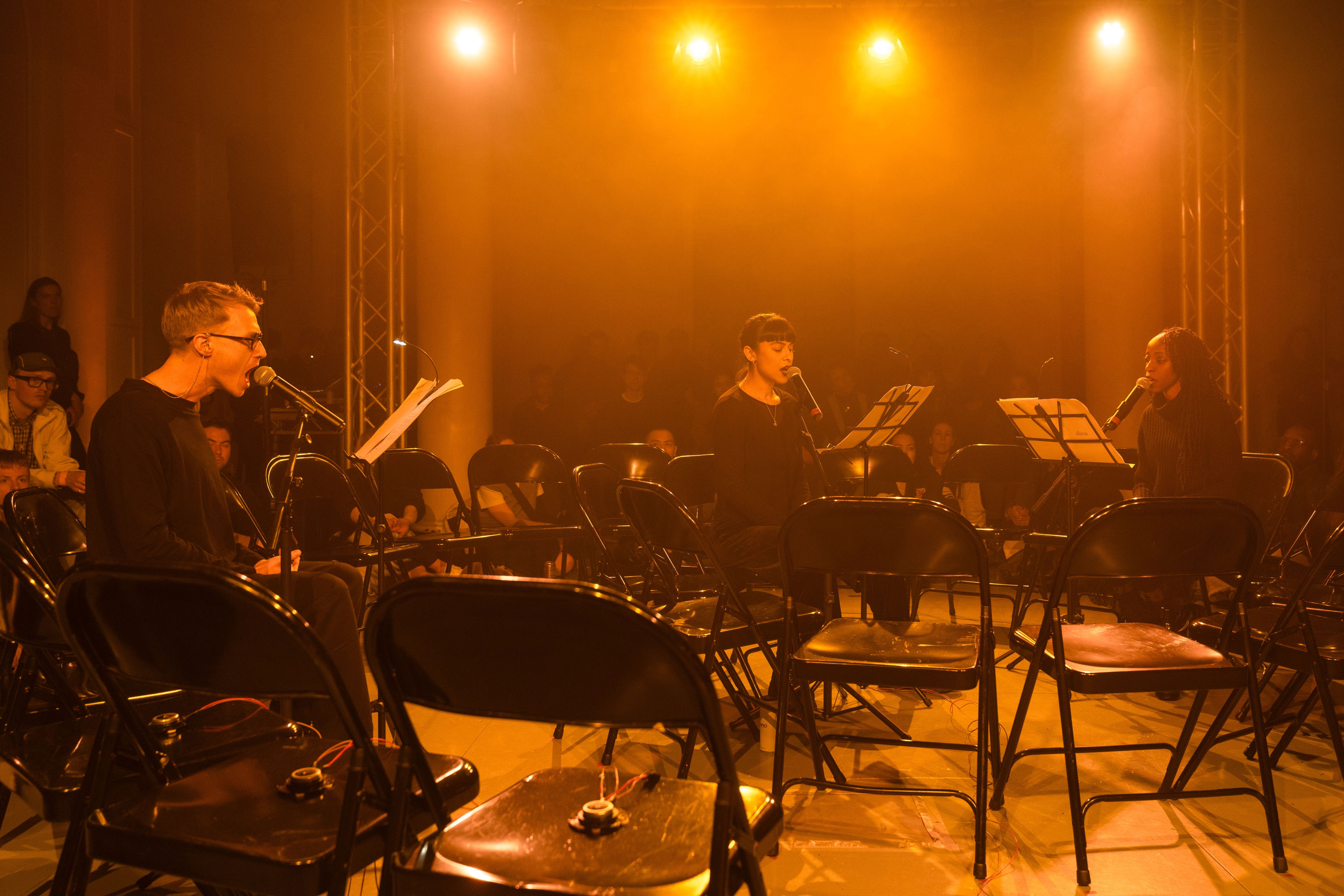 Ensemble performance under stage lighting, Assembly 2024, Somerset House Studios