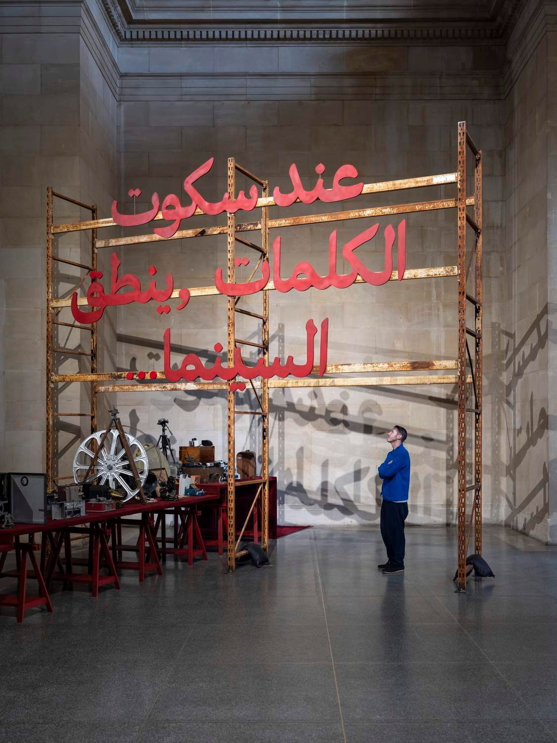 Arabic cinema sign over vintage camera equipment in the North Duveen, Zineb Sedira, When Words Fall Silent, Cinema Speaks…, Tate Britain