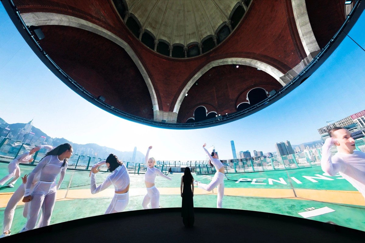 A visitor inside the 360-degree LED screen with dancers on a Hong Kong rooftop, Wayne McGregor, On The Other Earth, Stone Nest