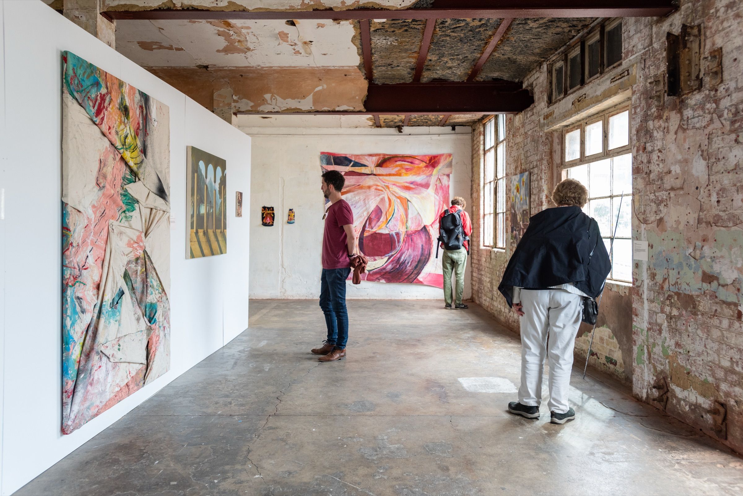 Visitors engaging with the work