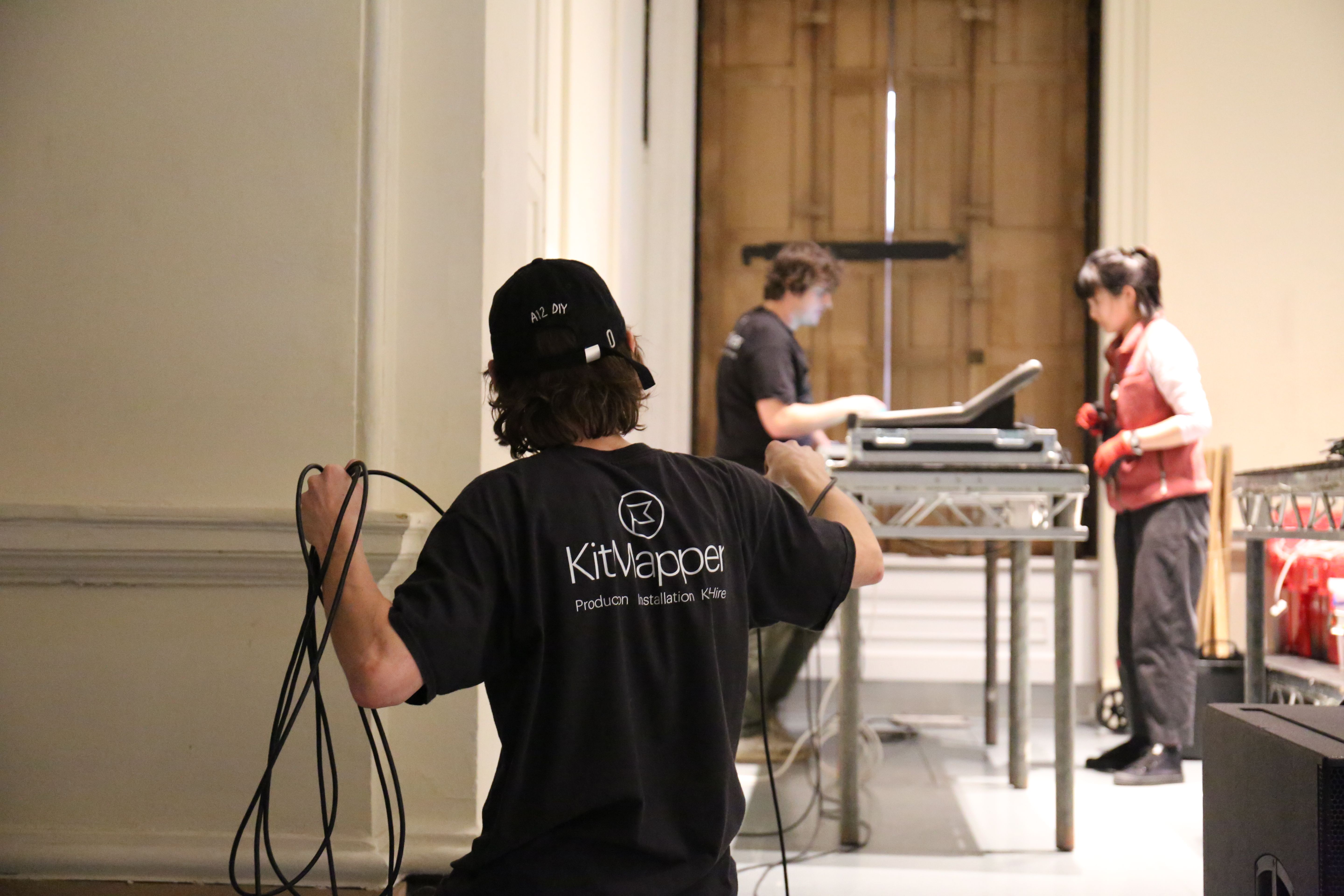 KitMapper crew preparing cable and control desks for Assembly 2024, Somerset House