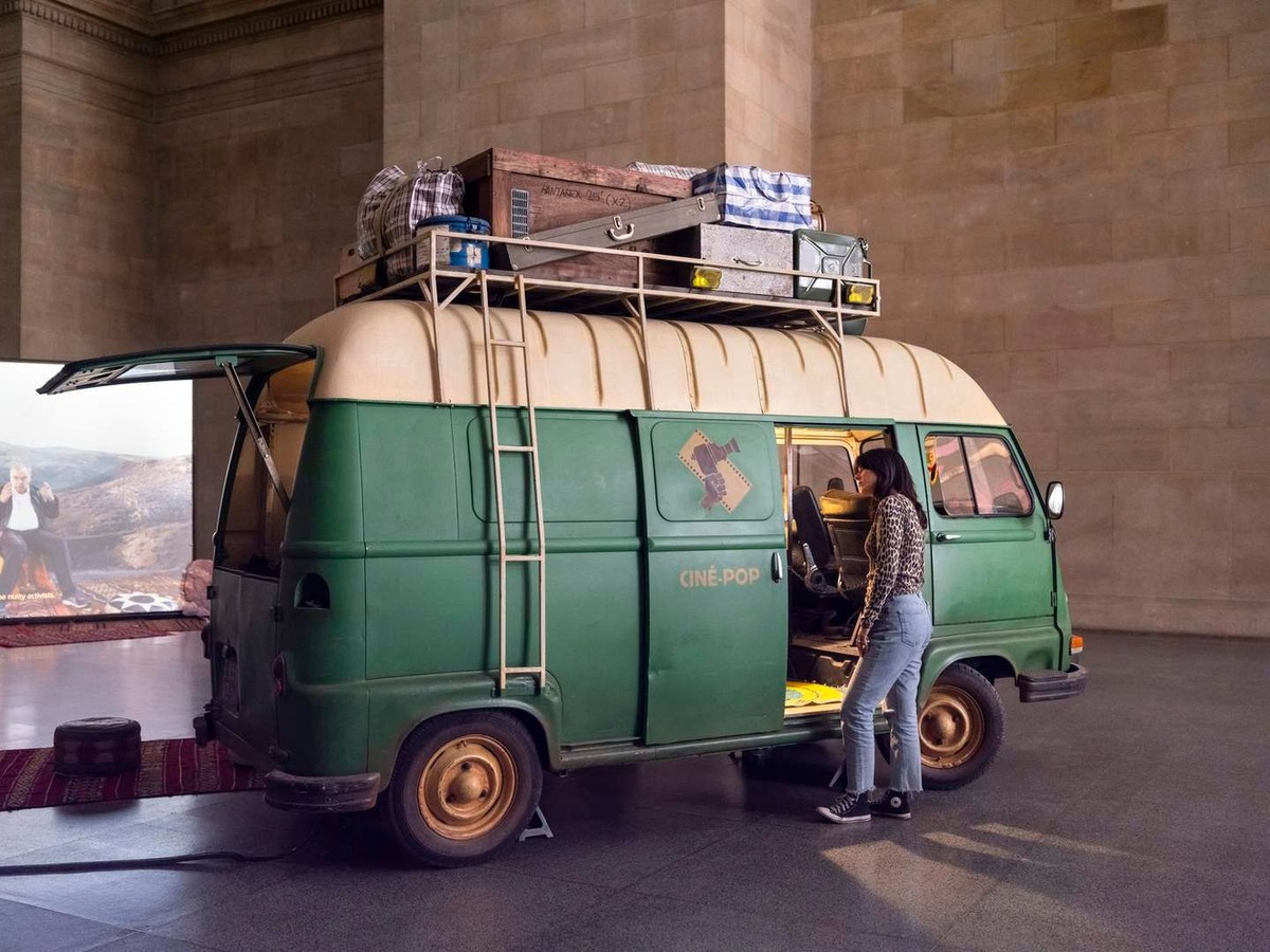 The Ciné Pop van with Narration in Motion projected on a canvas screen, Zineb Sedira, When Words Fall Silent, Cinema Speaks…, Tate Britain