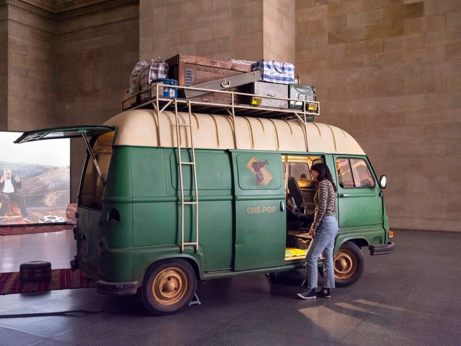 The Ciné Pop van with Narration in Motion projected on a canvas screen, Zineb Sedira, When Words Fall Silent, Cinema Speaks…, Tate Britain
