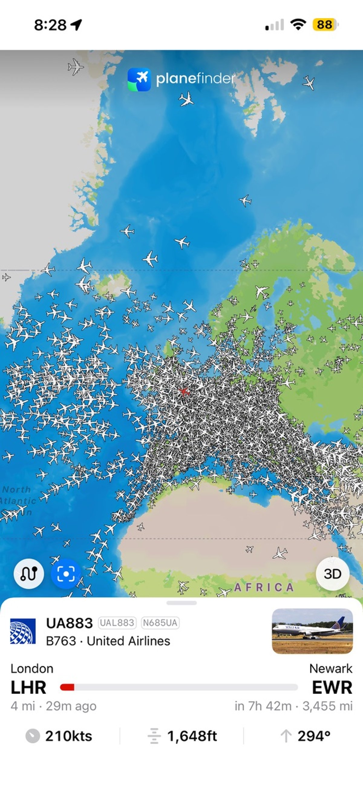 A screenshot of the app Plane Finder showing many plane shaped markers.