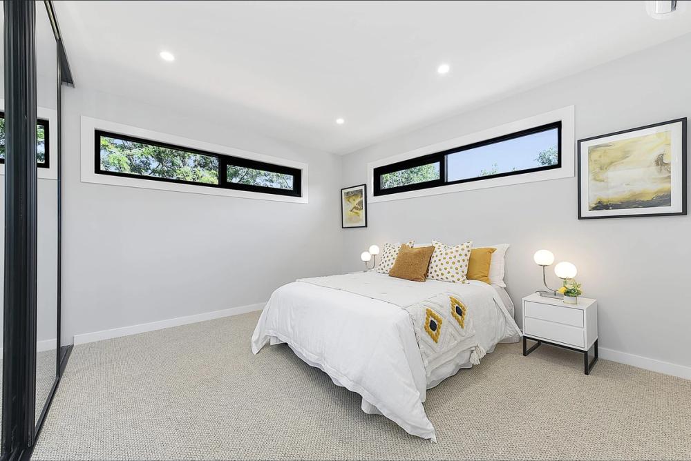 Master bedroom with clerestory windows and framed art, Bentleigh East Development, Bentleigh East
