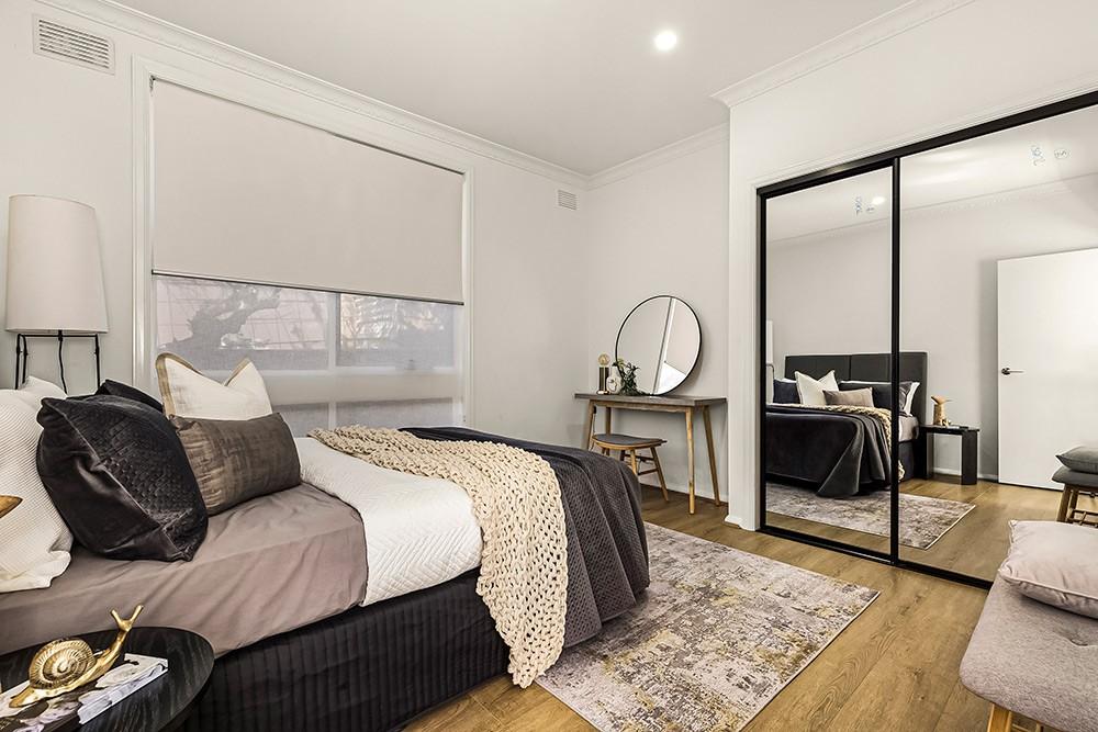 Master bedroom with mirrored built-in robe and dressing nook, Brunswick Transformation, Melbourne