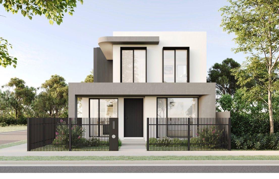 Contemporary two-storey rendered custom home behind a black steel fence - Collingwood Residence by SIARI Build, Melbourne