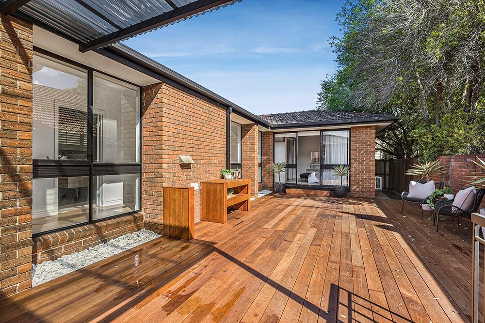 Rear timber deck and outdoor setting against the brick extension, Brunswick Transformation, Brunswick
