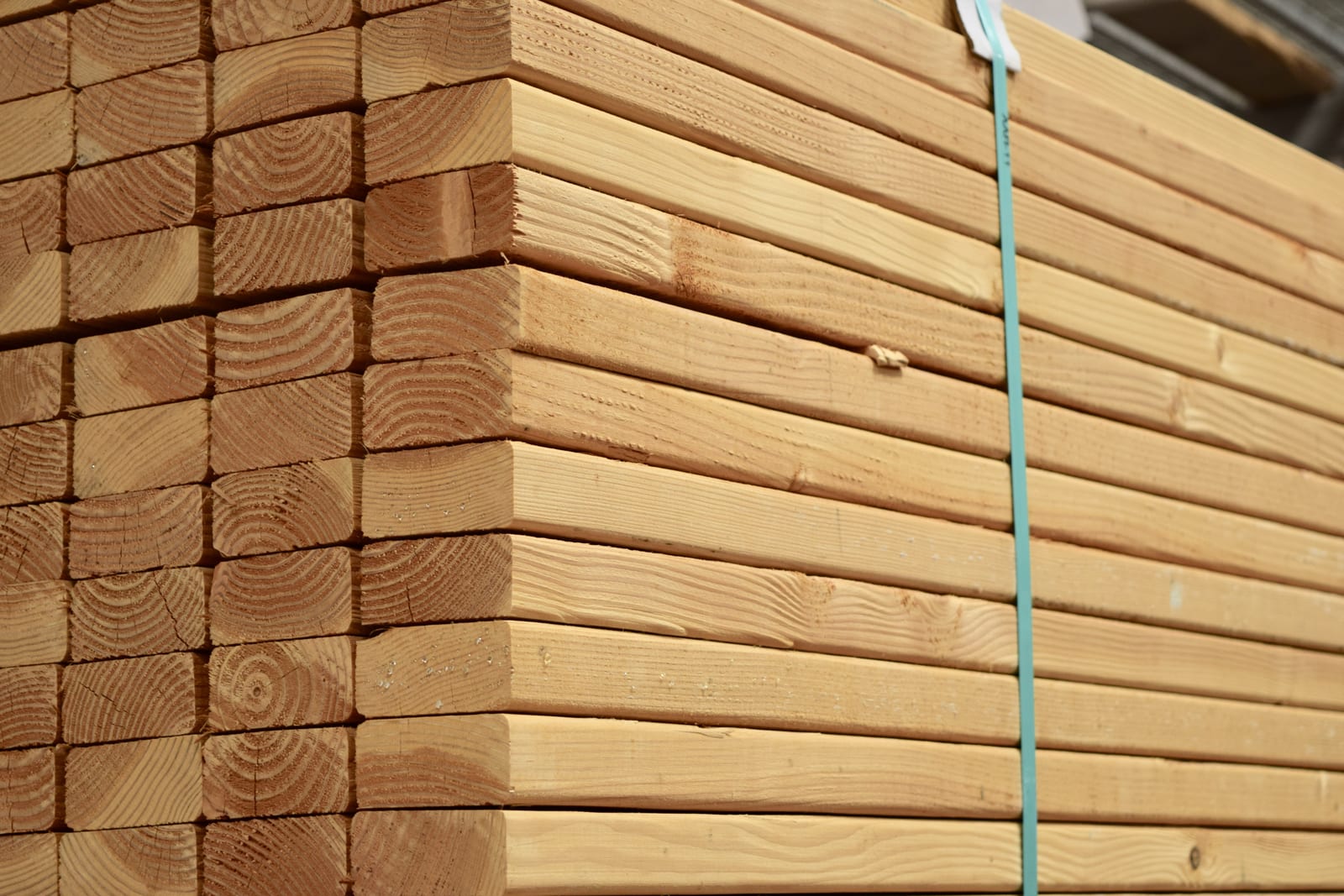 Closeup of cut and stacked SPF lumber at a construction site