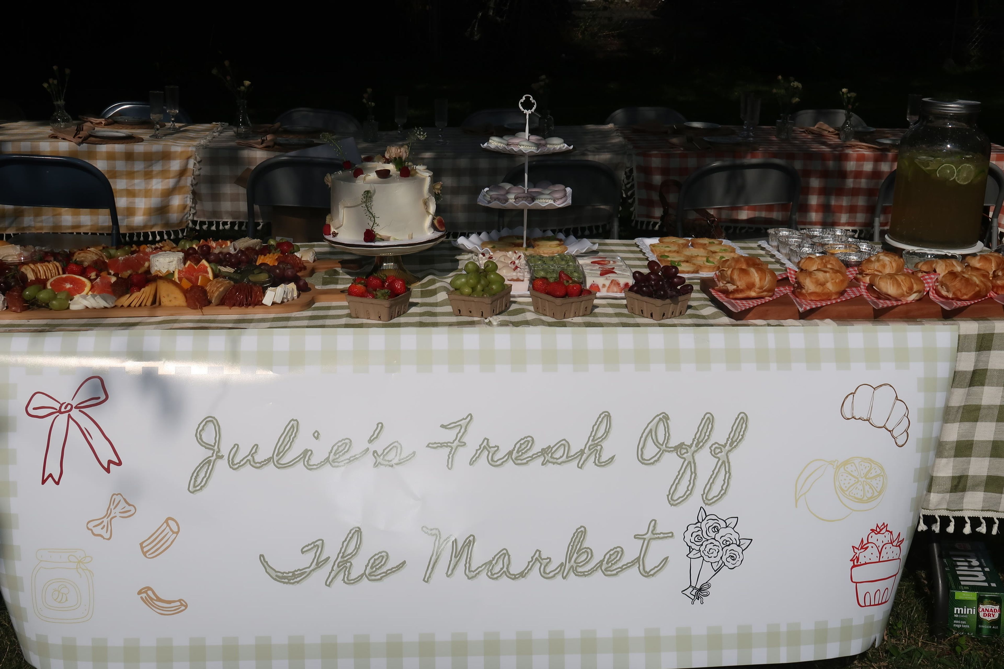 A hand-lettered sign reading Julie's Fresh Off the Market