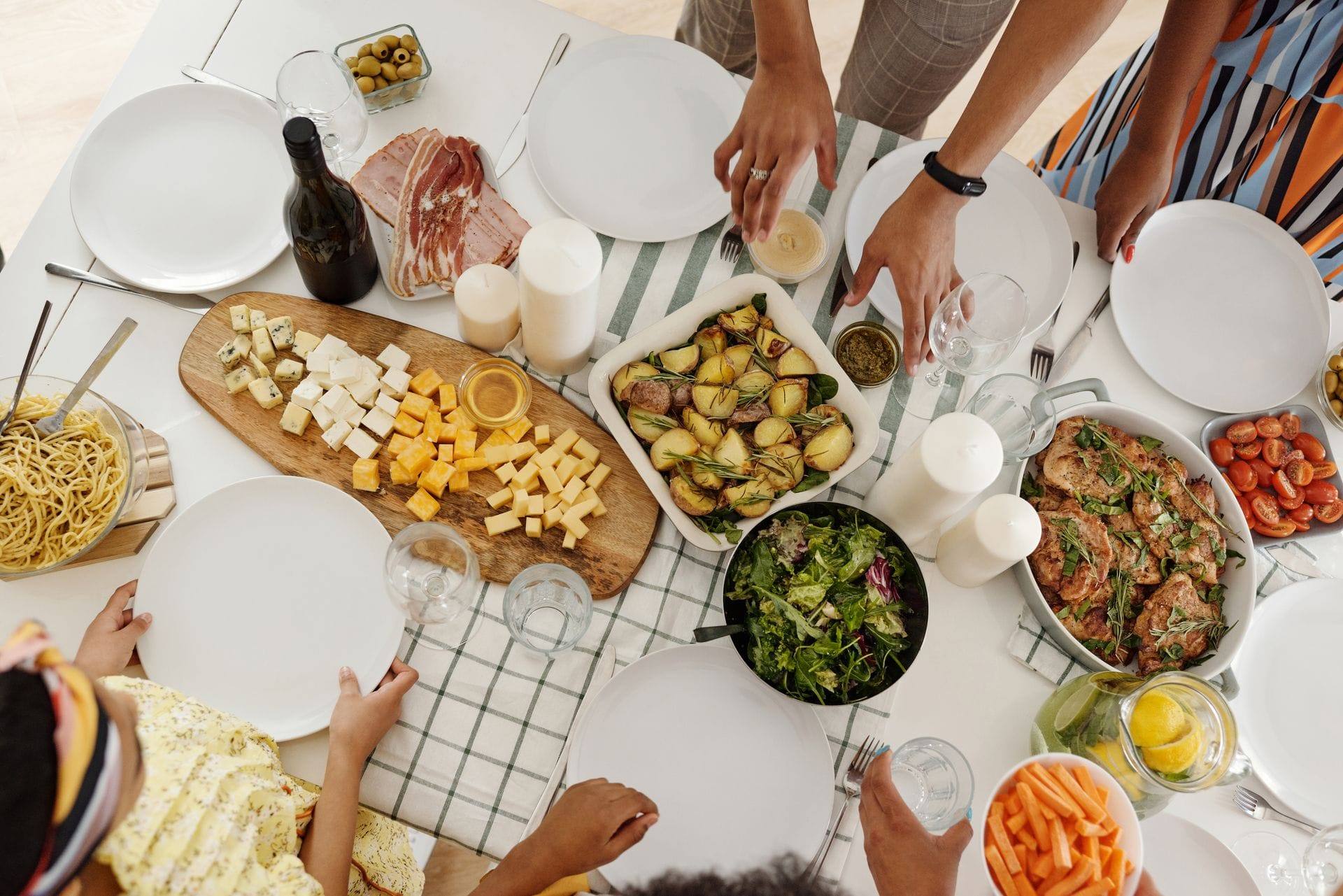 Overhead view of a diverse family enjoying a shared meal together
