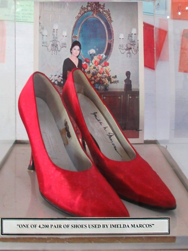 Signed pair of shoes once owned by Imelda Marcos, displayed in a museum