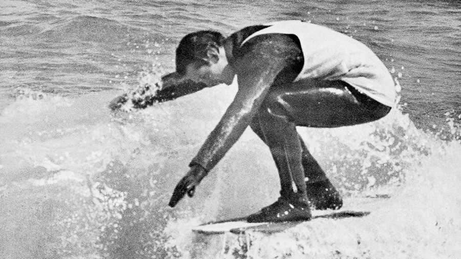 Jim Phillips surfing