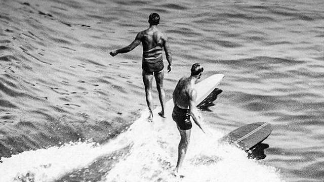 Plank surfboard, right, and hollow board, Los Angeles, 1930s