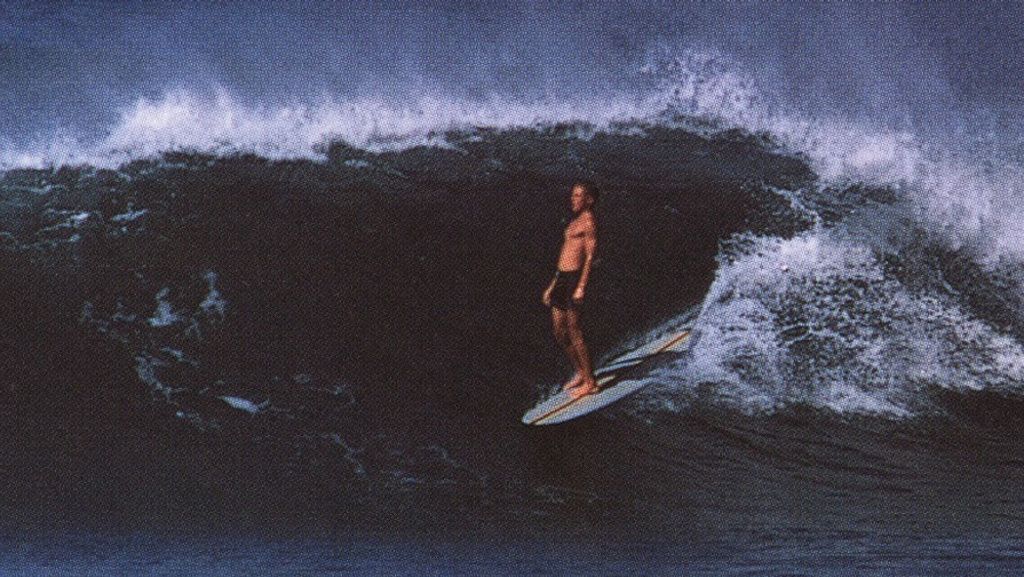 Surfer Mike Hynson surfing in 1962