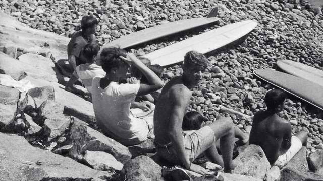 Maine surfers watching the waves, 1966