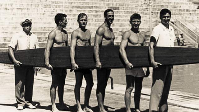 Tarzan Smith (center-right), Waikiki, 1940