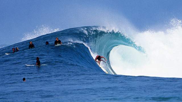 Dropping into a hollow wave at Backdoor, 2002. Photo: Tom Servais