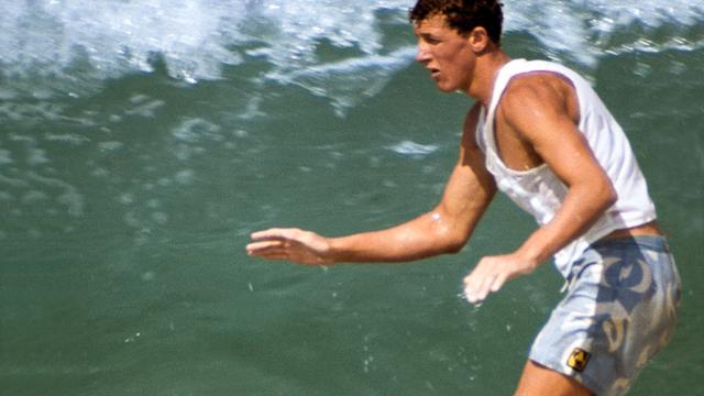Nat Young wearing Hang Ten trunks, 1966. Photo: Ron Stoner