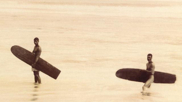 Hawaiian surfers with alaia boards