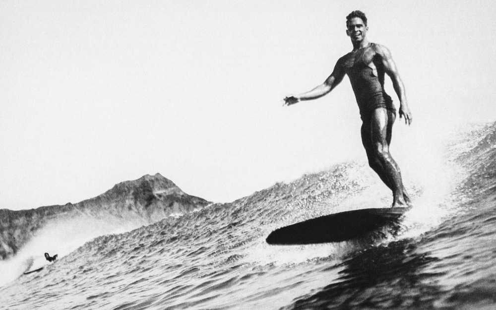 Harry Fields surfing waikiki in 1932