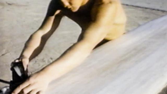 Greg Noll Shapes a Balsa Surfboard, 1956