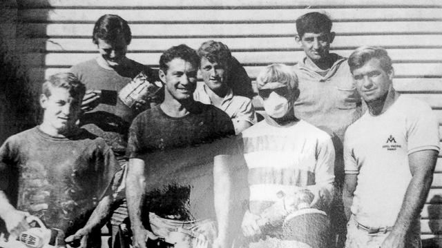 Bennett (black shirt) and factory works, around 1967