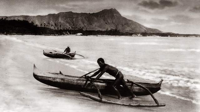 Canoe surfer, Waikiki, around 1900