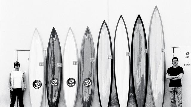 Greg Long (right) and boardmaker Chris Christenson, 2012. Photo: Todd Glaser