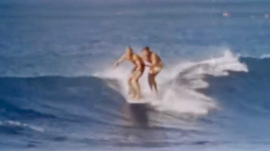 mike hynson and miki dora surfing in hawaii