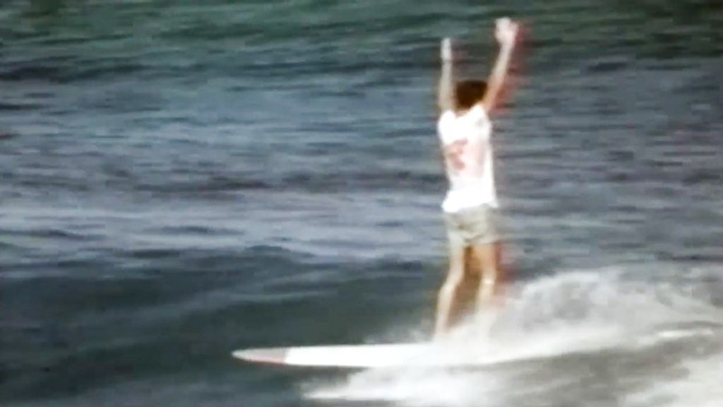 Corky Carroll surfing on the North Shore of Oahu in 1964