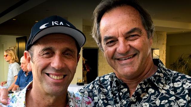 Paul Naude (right) and Olympic surfing promotor Fernando Aguerre, 2018