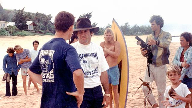 Fred Hemmings (center) talks to Jock Sutherland