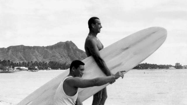 Carlos Dogny (top) with Rabbit Kekai, Waikiki, 1940s