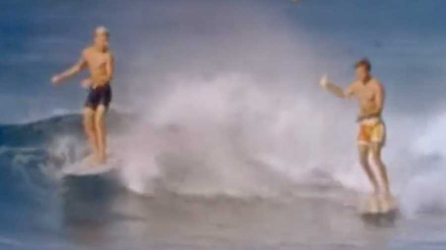 mike hynson and miki dora surfing in hawaii