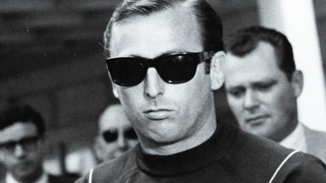 Jack Murphy in handcuffs