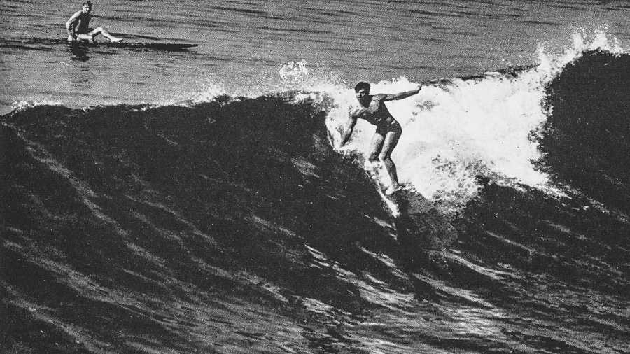 Calvin "Tulie" Clark surfing at Hermosa Beach Pier