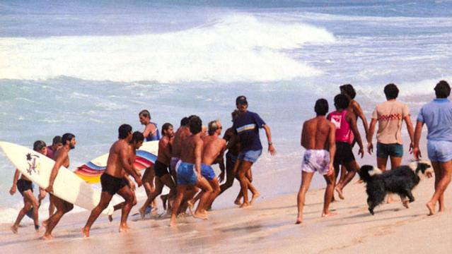 Steve Massfeller pulled from the water during '83 Pipeline Masters. Photo: Brian Bielmann