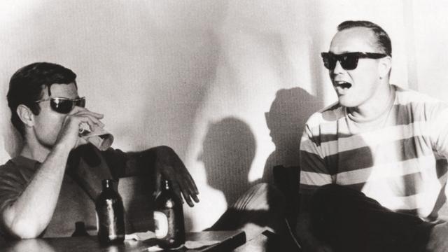 Greg Noll, right, and Miki Dora, 1965