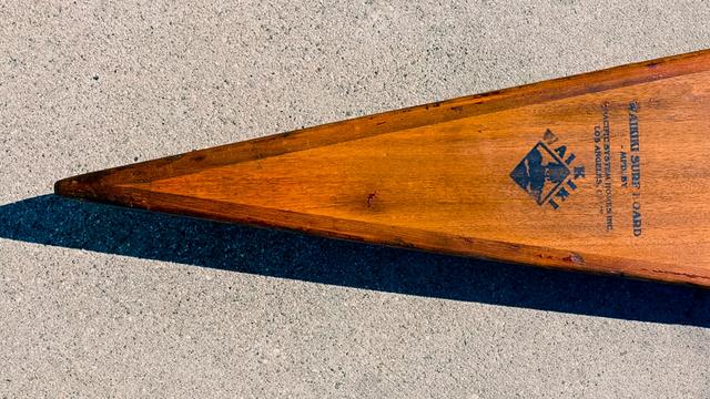 Pacific Systems Homes surfboard