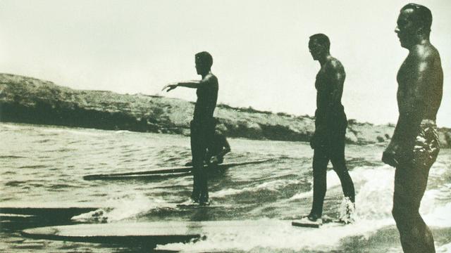 Carlos Dogny, right, 1953