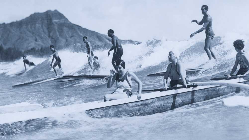 canoe surfing in waikiki in the 1930s