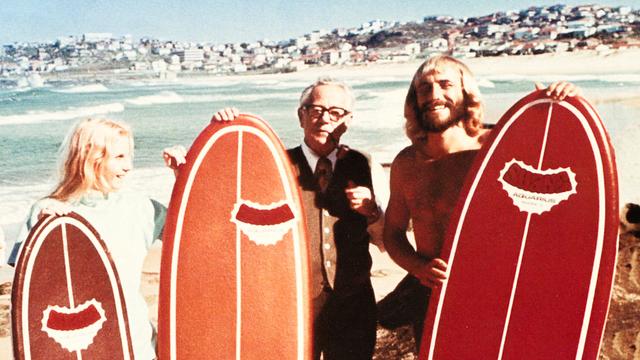 Shane Stedman (right) and coolite surfboards, Curl Curl Beach, 1972