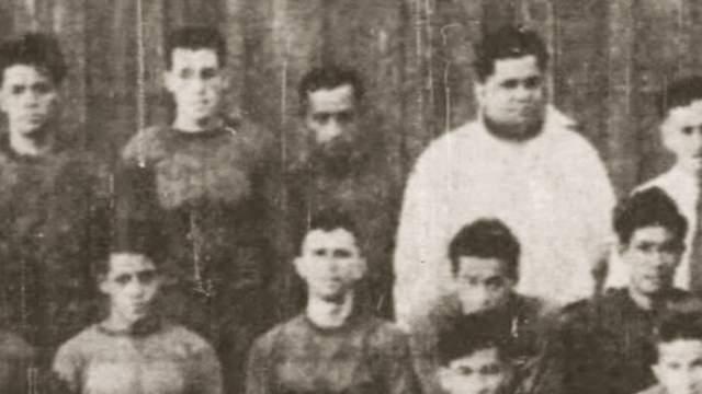Joseph Kaopuiki, top row center, 1936 football team