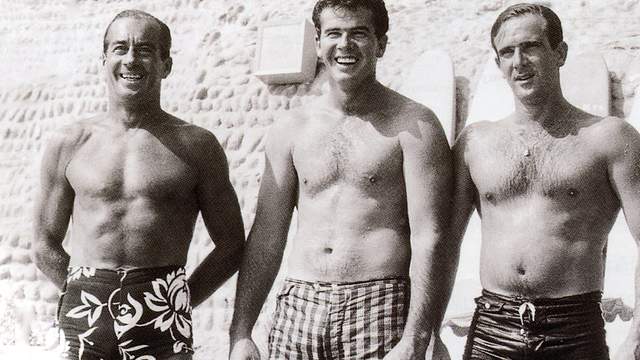 Carlos Dogny, left, with Mike Diffenderfer, center, and unknown, 1962