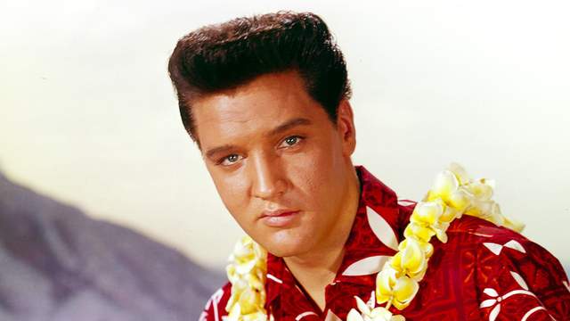 Elvis Presley playing a beachboy in Blue Hawaii, 1961