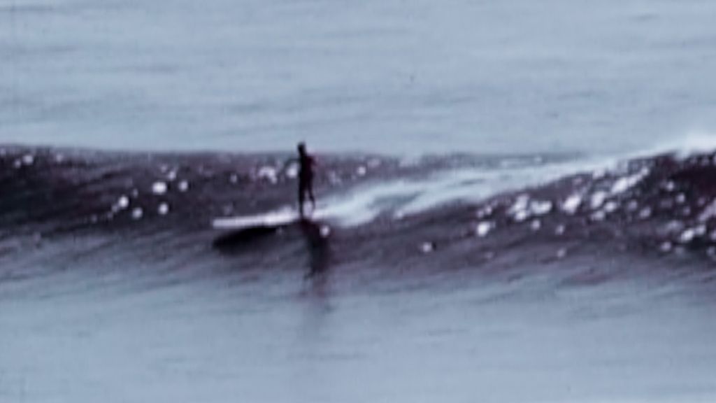 Surfer Bob Simmons on a balsa surfboard, around 1950