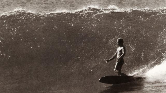 Russell Hughes on an overhead wave in Queensland, 1966. Photo: John Witzig