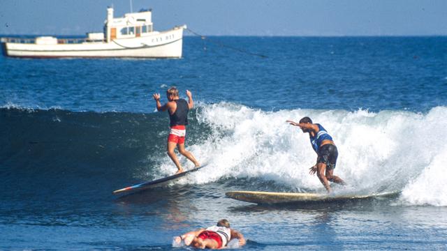 Johnny Fain (left) and Miki Dora. Photo: Ron Stoner