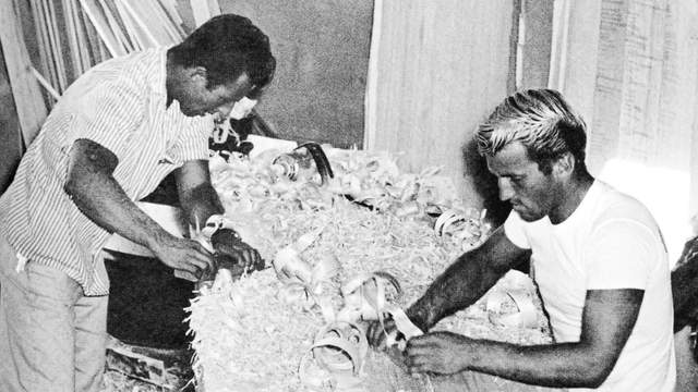 Dale Velzy (left) and "roughing out" a balsa blank, mid-1950s